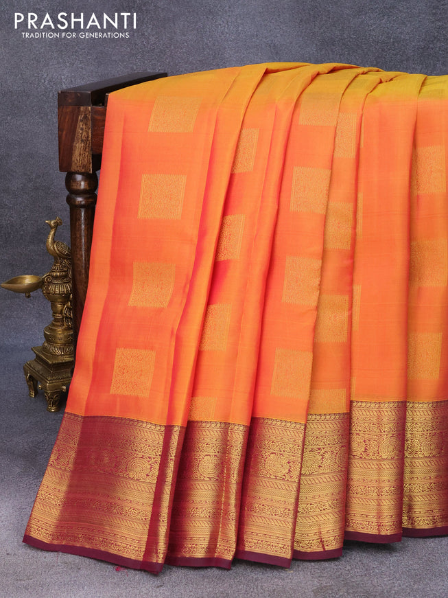 Roopam silk saree dual shade of mango yellow and wine shade with zari woven box type buttas and zari woven border