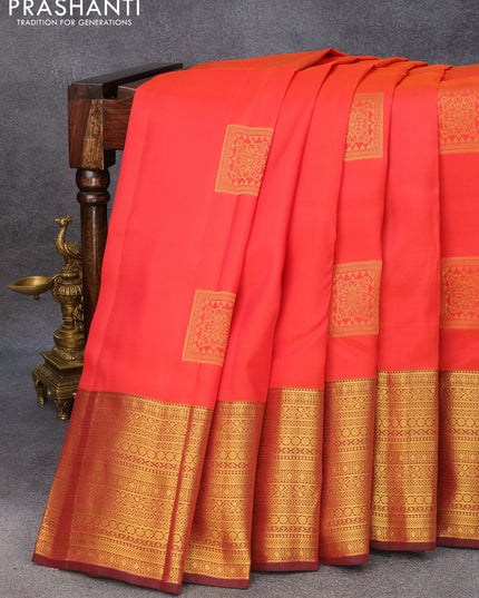 Roopam silk saree dual shade of reddish orange and maroon with zari woven box type buttas and long zari woven border