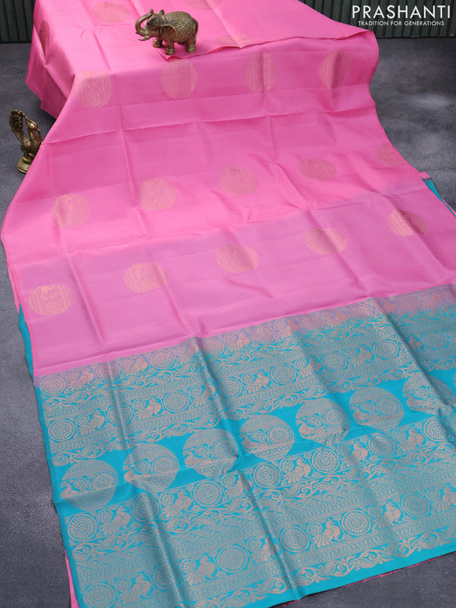 Roopam silk saree pink and teal green with copper zari woven buttas in borderless style