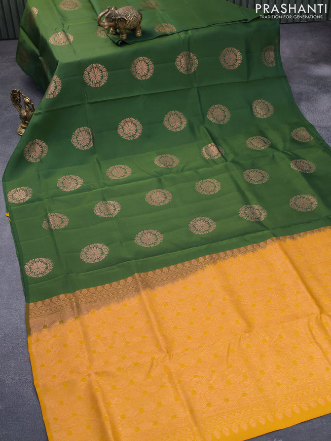 Roopam silk saree mehendi green and dark mustard with copper zari woven floral buttas in borderless style