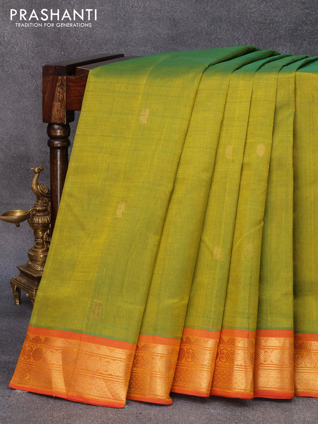 10 yards silk cotton saree dual shade of mustard green and red with annam & rudhraksha zari woven buttas and zari woven border without blouse