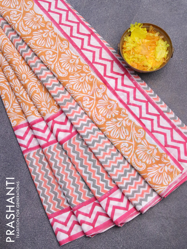 Jaipur cotton saree pale orange and pink with allover prints and printed border