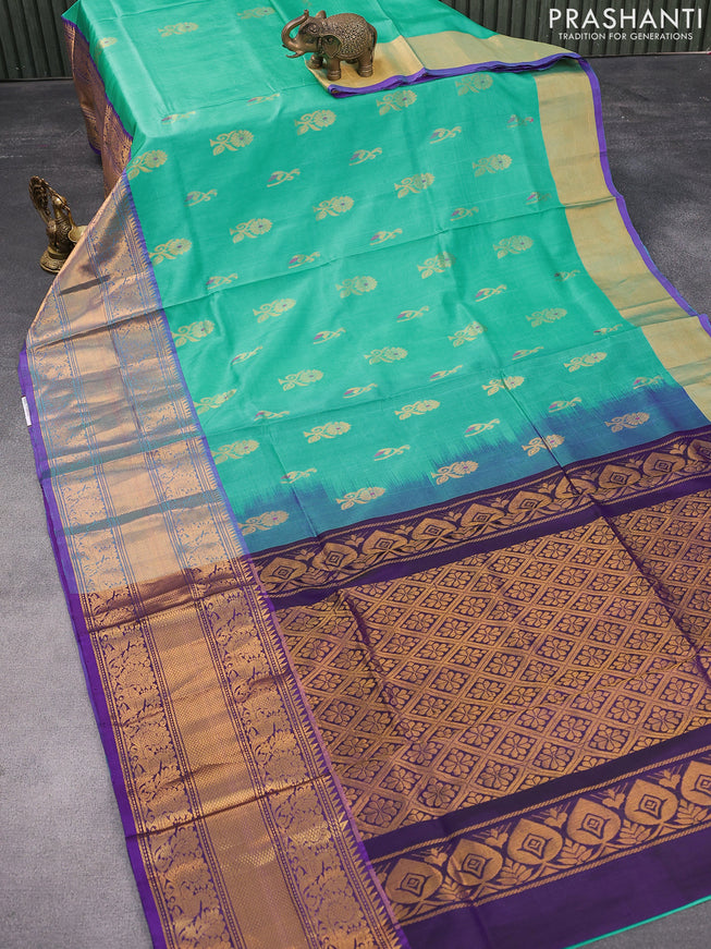Pure uppada silk saree teal blue and navy blue with silver & gold zari woven buttas and annam zari woven border