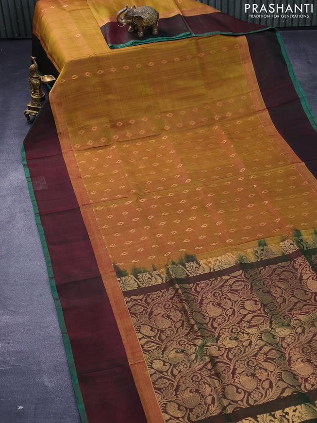 Pure uppada silk saree dual shade of mustard and dual shade of greenish maroon with allover thread & zari woven floral buttas and zari woven simple border