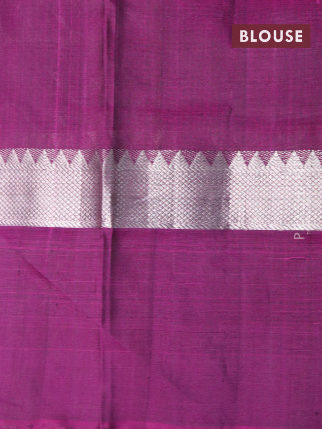 Pure uppada silk saree bottle green and dark magenta pink with allover silver zari woven buttas and silver zari woven floral border