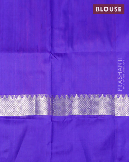 Pure uppada silk saree dual shade of purple and blue with allover silver zari woven buttas and silver zari woven floral border