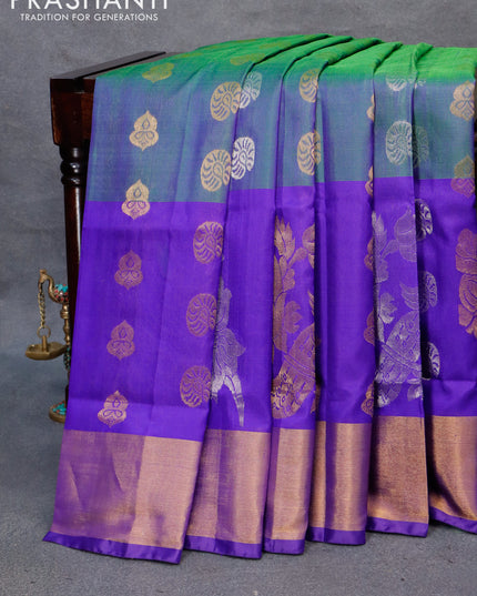 Pure uppada silk saree dual shade of bluish green and royal blue with silver & gold zari woven buttas and long peacock design zari woven border
