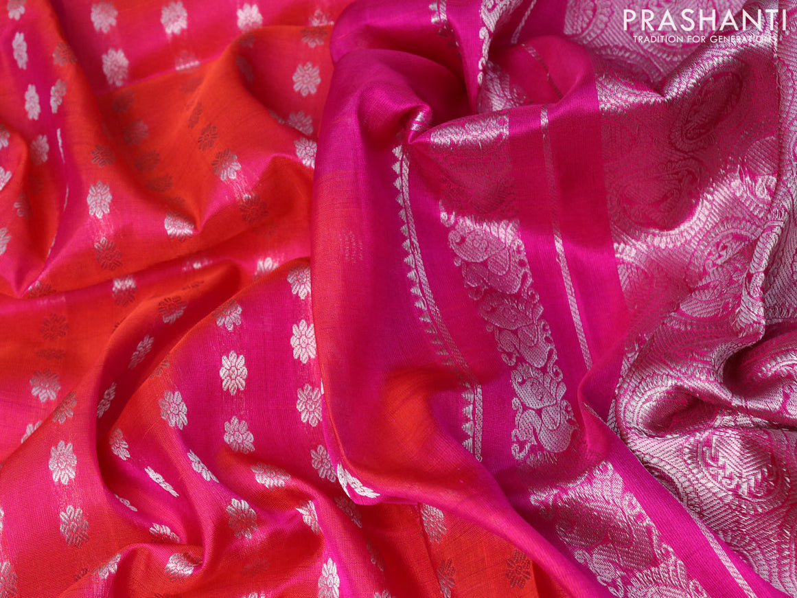 Pure uppada silk saree dual shade of pinkish orange and pink with allover silver zari woven floral buttas and silver zari woven ikat style border