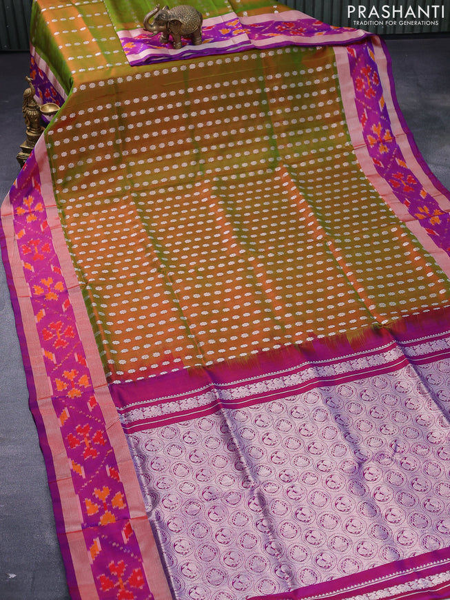 Pure uppada silk saree dual shade of greenish maroon and dual shade of purple with allover silver zari woven floral buttas and silver zari woven ikat style border