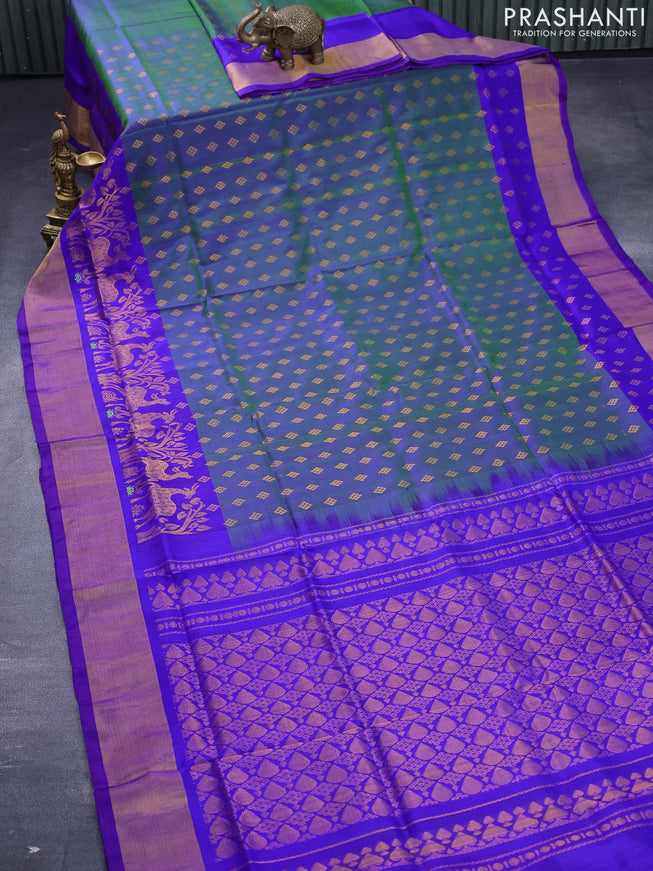 Pure uppada silk saree dual shade of bluish green and blue with allover zari woven buttas and deer design zari woven border