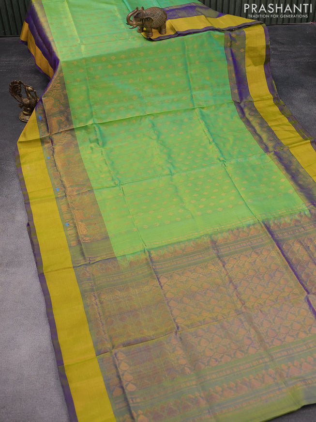 Pure uppada silk saree dual shade of green and dual shade of bluish green with allover zari woven buttas and deer design zari woven border