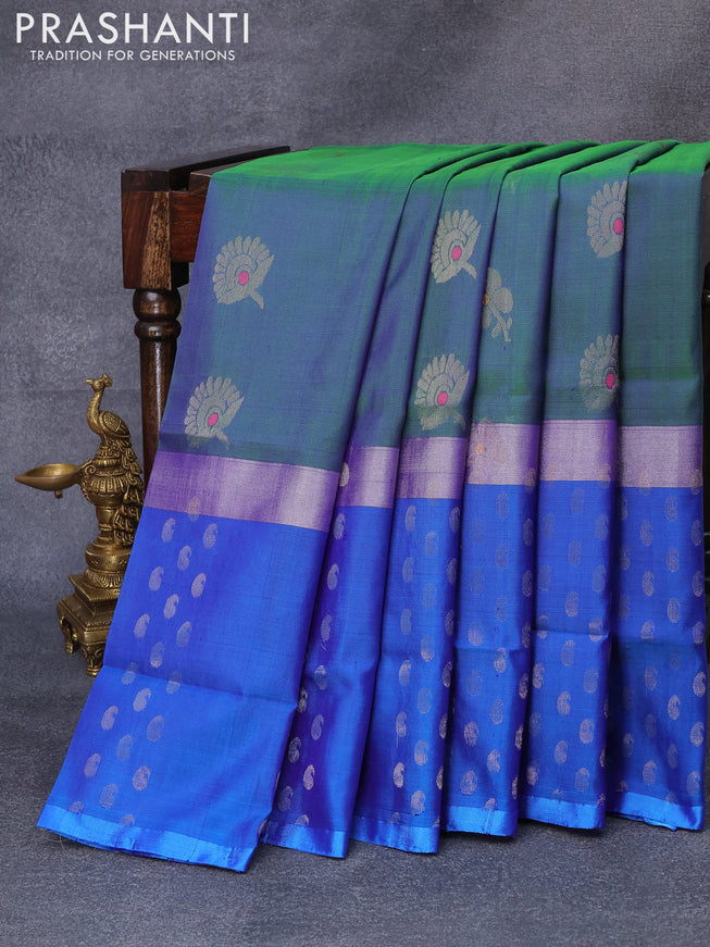 Pure uppada silk saree dual shade of bluish green and cs blue with silver zari woven buttas and silver zari woven butta border