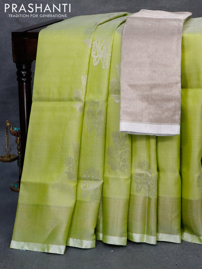 Pure uppada silk saree pista green with allover silver zari woven buttas and zari woven border