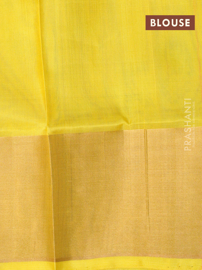 Pure uppada silk saree dual shade of rustic orange and yellow with allover ikat weaves and zari woven border
