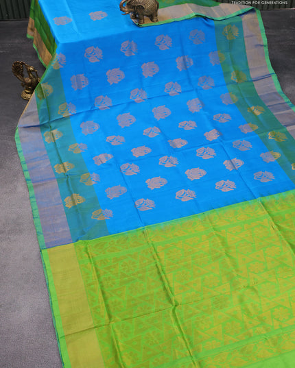 Pure uppada silk saree cs blue and parrot green with zari woven buttas and zari woven border