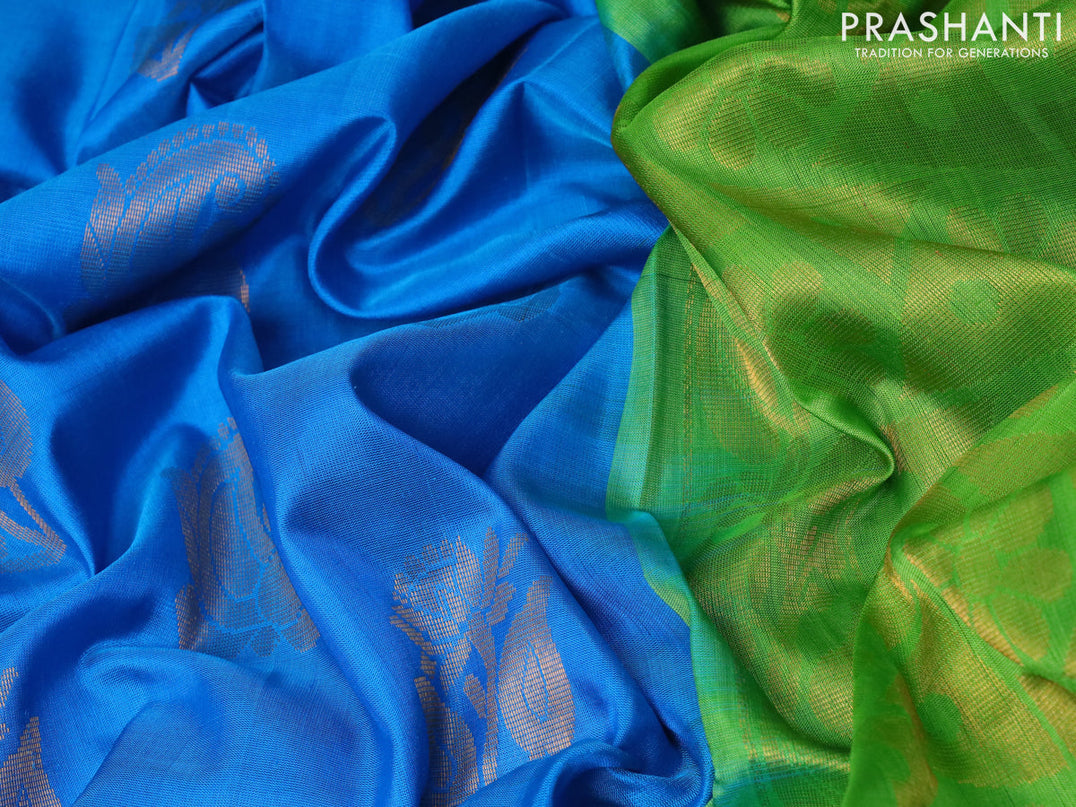 Pure uppada silk saree cs blue and parrot green with zari woven buttas and zari woven border