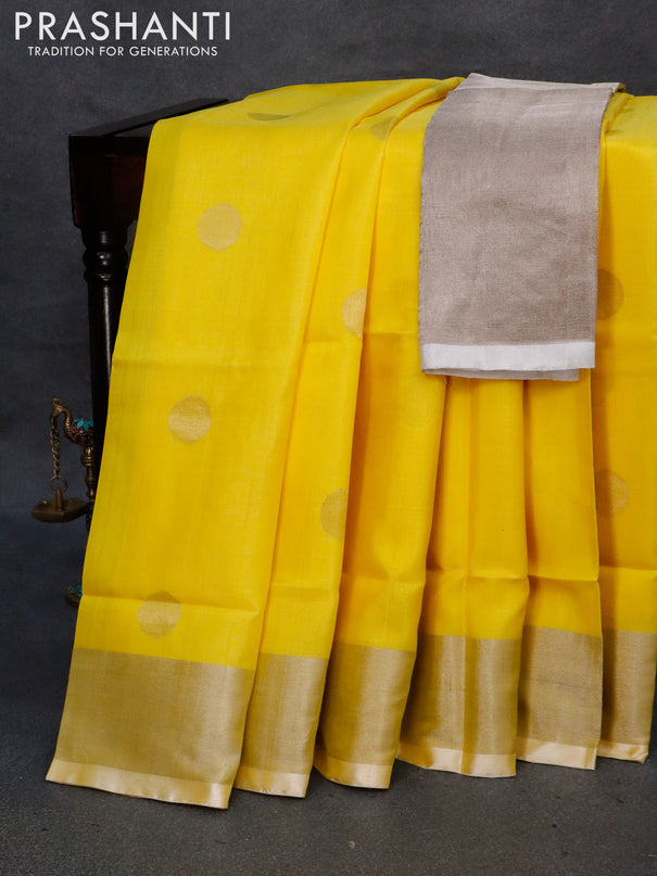 Pure uppada silk saree yellow with silver zari woven coin buttas and silver zari woven border