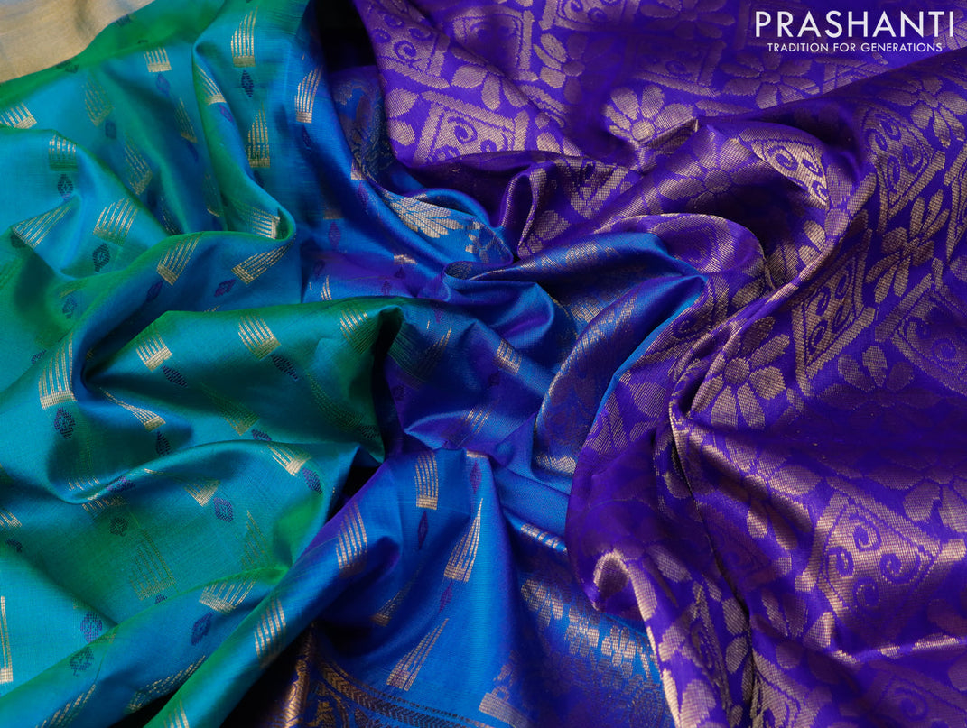Pure uppada silk saree dual shade of bluish green and blue with allover thread & zari woven buttas and long peacock design zari woven border