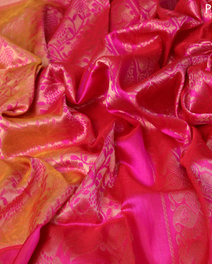 Pure uppada silk saree dual shade of pink and pink with allover floral zari woven brocade weaves and long peacock design zari woven border