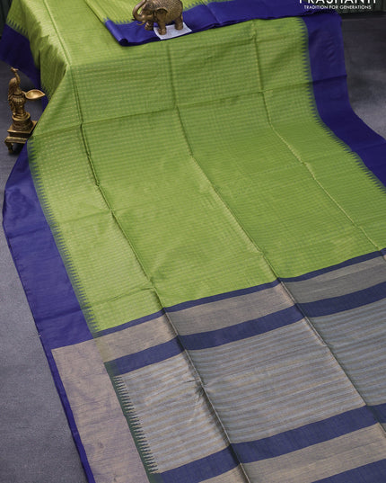 Semi tussar saree light green and blue with allover checked pattern & zari weaves and temple woven simple border