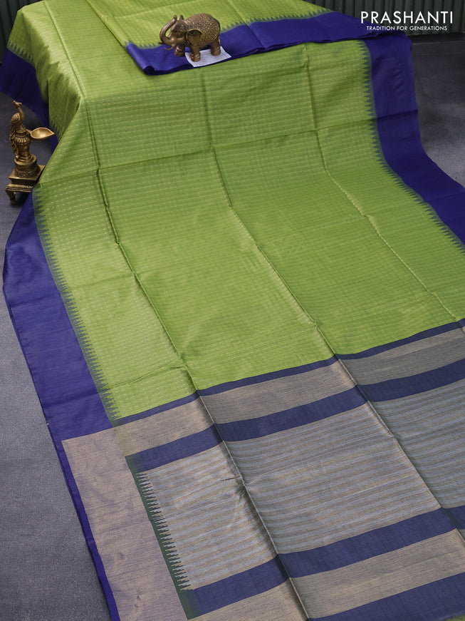 Semi tussar saree light green and blue with allover checked pattern & zari weaves and temple woven simple border