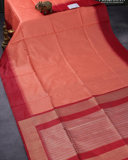 Semi tussar saree peach orange and maroon with allover checked pattern & zari weaves and temple woven simple border