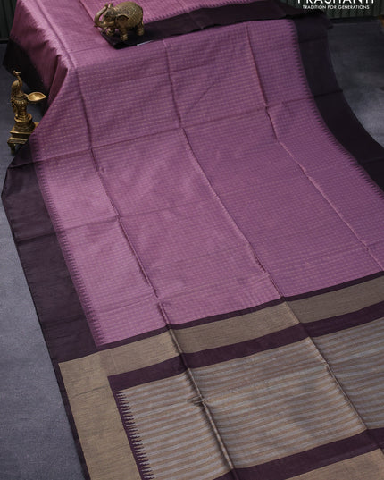 Semi tussar saree mild purple shade and deep wine shade with allover checked pattern & zari weaves and temple woven simple border