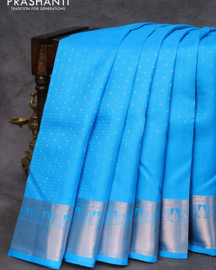 Pure kanjivaram silk saree light blue and peach pink with allover self emboss & silver zari buttas and silver zari woven border