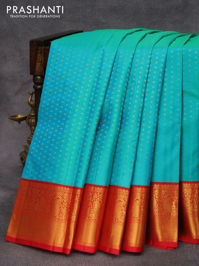 Pure kanjivaram silk saree dual shade of teal bluish green and red with allover zari woven 1000 buttas and zari woven korvai border