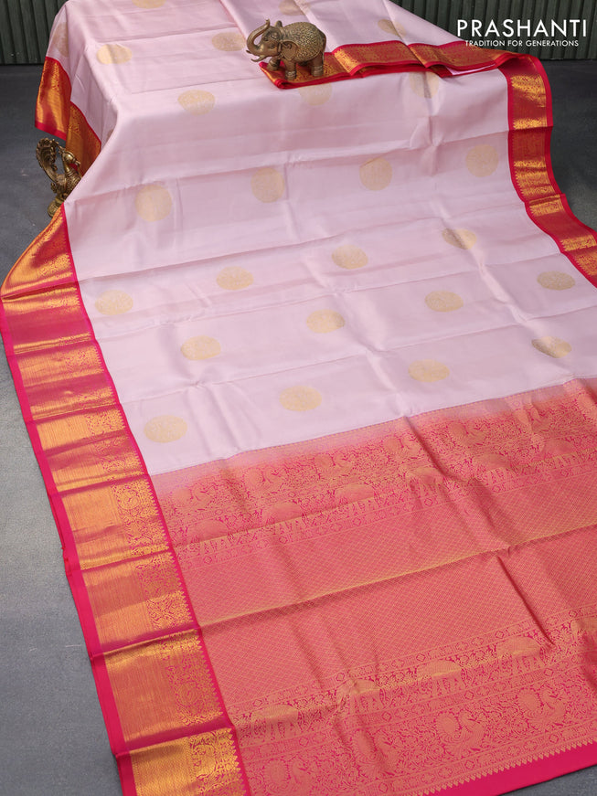 Pure kanjivaram silk saree pastel pink shade and dual shade of reddish pink with zari woven buttas and rich zari woven korvai border