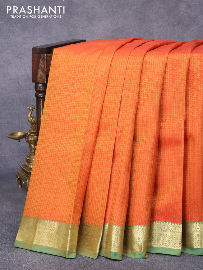 Pure kanjivaram silk saree sunset orange and green with allover self emboss and zari woven border