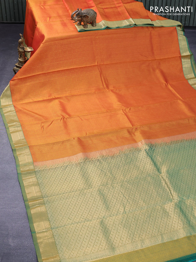 Pure kanjivaram silk saree sunset orange and green with allover self emboss and zari woven border