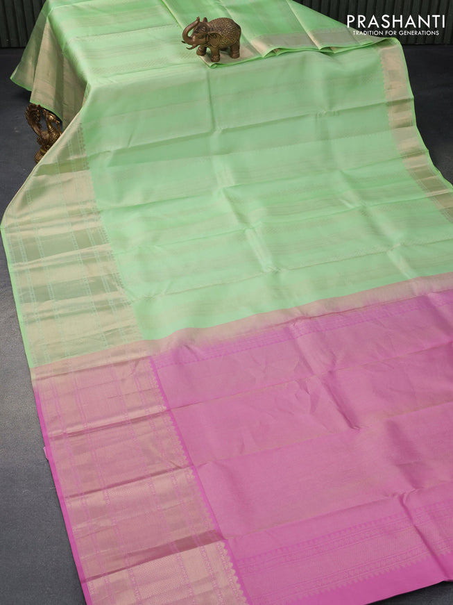 Pure kanjivaram silk saree pista green and mauve pink with allover zari weaves and long zari woven border