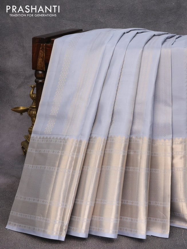 Pure kanjivaram silk saree grey with allover silver zari weaves and long zari woven border