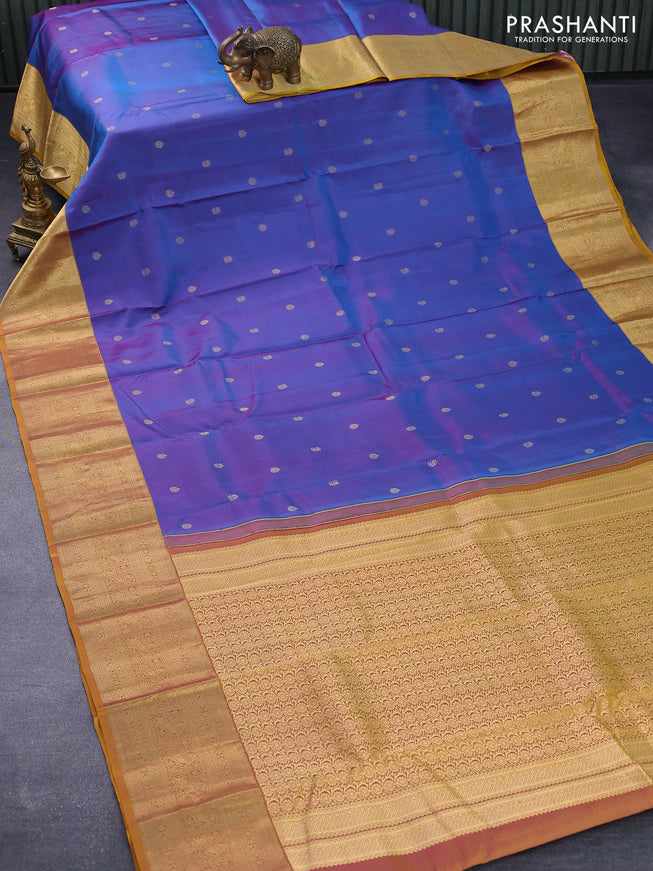 Pure kanjivaram silk saree dual shade of cs blue and mustard yellow with zari woven buttas and zari woven border