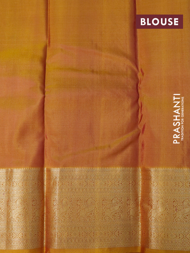 Pure kanjivaram silk saree dual shade of cs blue and mustard yellow with zari woven buttas and zari woven border