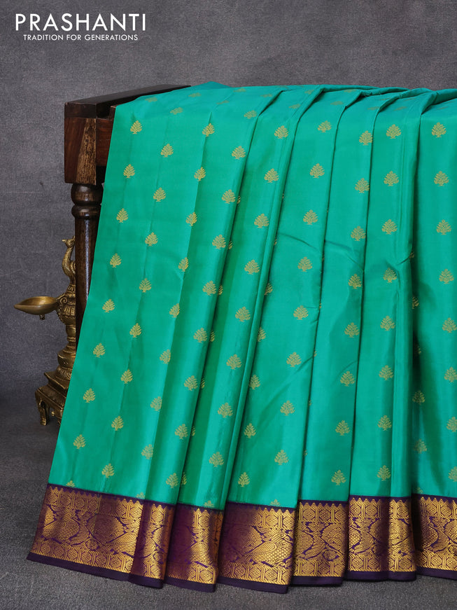 Pure kanjivaram silk saree teal green and deep violet with zari woven buttas and zari woven korvai border