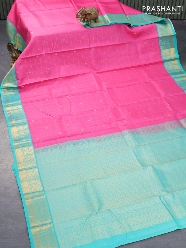 Pure kanjivaram silk saree light pink and teal blue with allover zari checks & buttas and annam zari woven korvai border