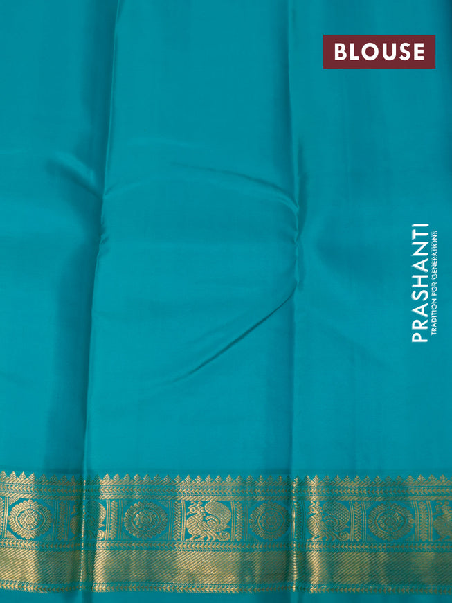 Pure kanjivaram silk saree light pink and teal blue with allover zari checks & buttas and annam zari woven korvai border