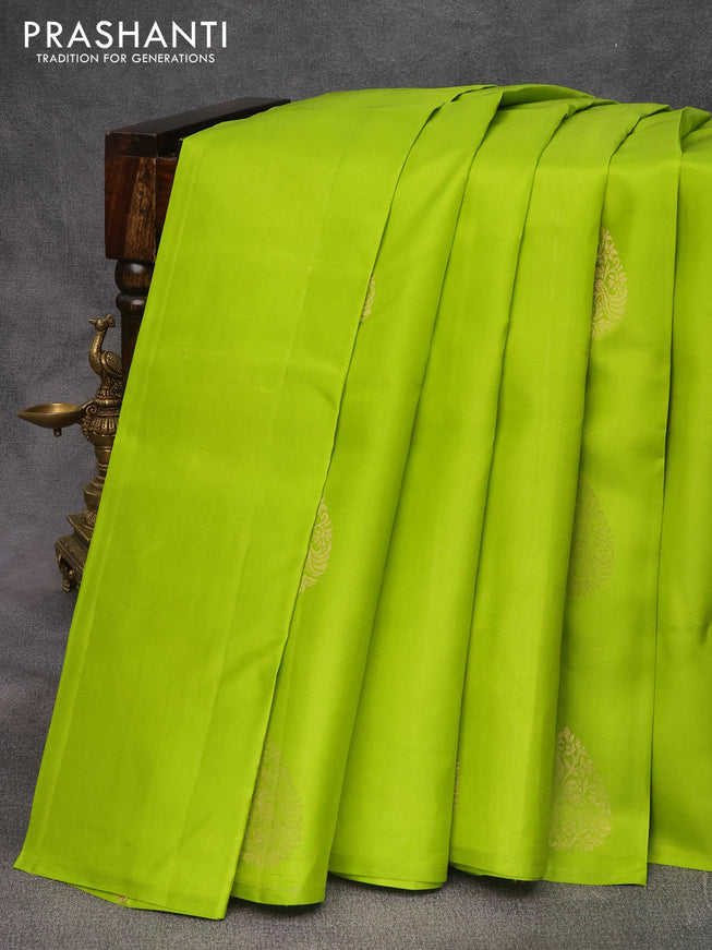 Pure kanjivaram silk saree light green and purple with zari woven buttas in borderless style