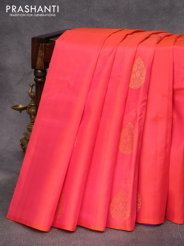 Pure kanjivaram silk saree dual shade of pinkish orange and violet with zari woven buttas in borderless style