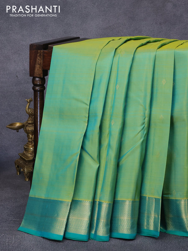 Pure kanjivaram silk saree dual shade of yellowish green and green with zari woven buttas and zari woven border