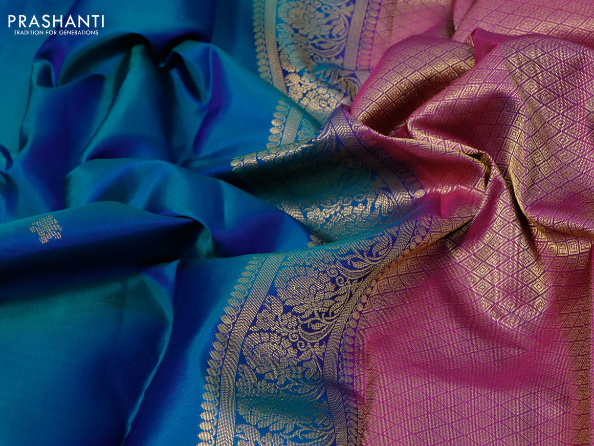 Pure kanjivaram silk saree dual shade of bluish green and purple with zari woven buttas and floral zari woven border