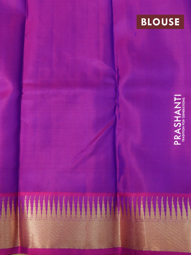 Pure kanjivaram silk saree dual shade of bluish green and purple with zari woven buttas and temple design zari woven border