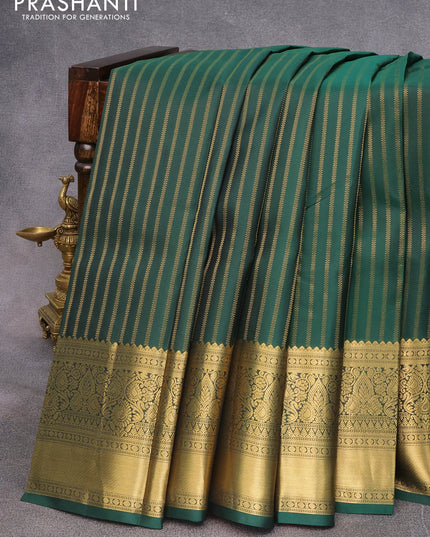 Pure kanjivaram silk saree dark green and red with allover zari weaves and zari woven border