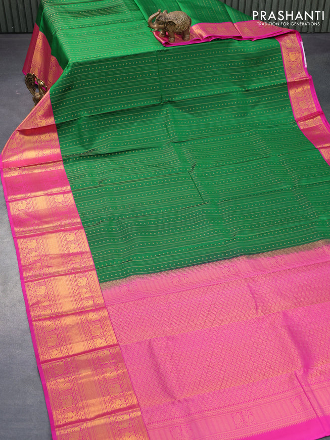 Pure kanjivaram silk saree green and pink with allover zari weaves and long zari woven korvai border