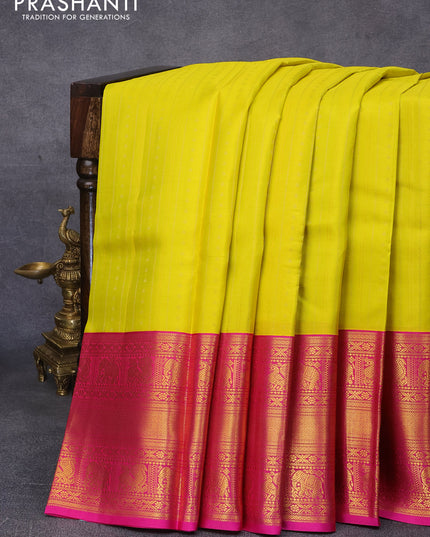 Pure kanjivaram silk saree lime yellow and pink with allover zari weaves and long zari woven korvai border