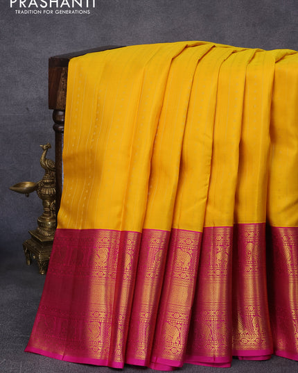 Pure kanjivaram silk saree mango yellow and pink with allover zari weaves and long zari woven korvai border