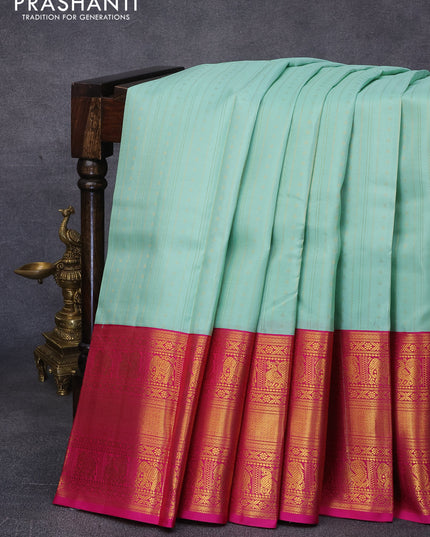 Pure kanjivaram silk saree pastel green and pink with allover zari weaves and long zari woven korvai border