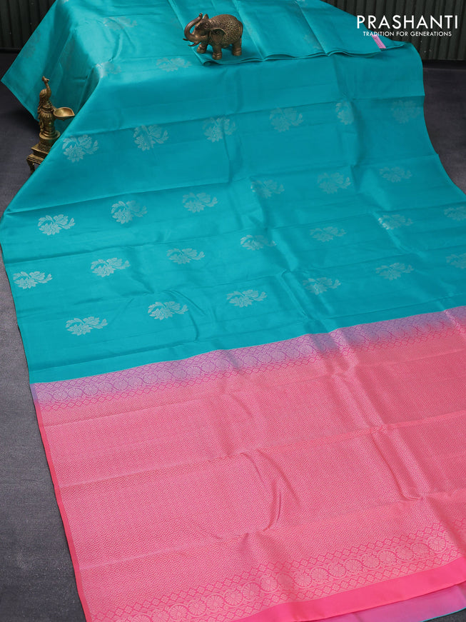 Pure kanjivaram silk saree teal blue and peach pink with silver zari woven buttas in borderless style